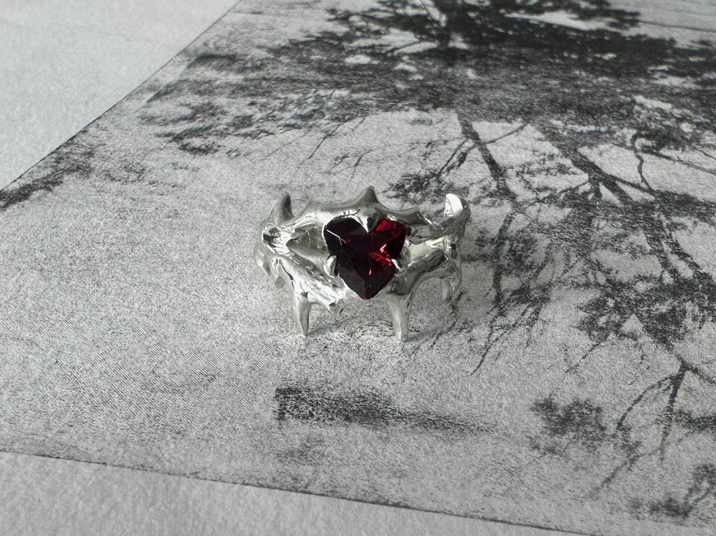 SP garnet ring