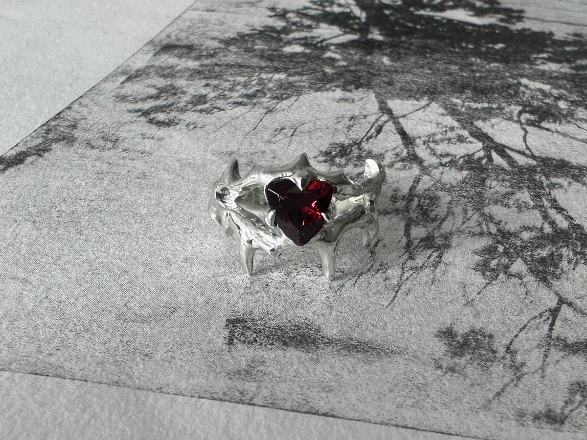 SP garnet ring