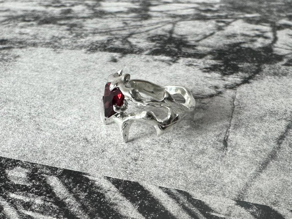 SP garnet ring