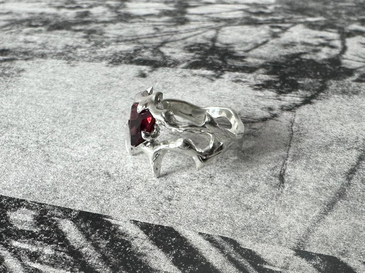 SP garnet ring