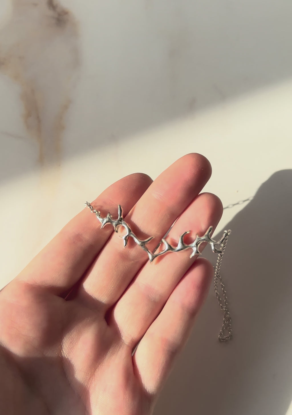 TB necklace